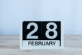 February 28th. Cube calendar for february 28 on wooden table with empty space For text. Not Leap year or intercalary day