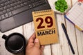 February 29th. Cube calendar for February 29 on wooden surface with copyspace for your text. Leap year, intercalary day Royalty Free Stock Photo