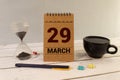 February 29th. Cube calendar for February 29 on wooden surface with copyspace for your text. Leap year, intercalary day Royalty Free Stock Photo