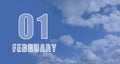 february 01. 01-th day of the month, calendar date.White numbers against a blue sky with clouds. Copy space, winter Royalty Free Stock Photo