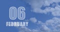 february 06. 06-th day of the month, calendar date.White numbers against a blue sky with clouds. Copy space, winter Royalty Free Stock Photo