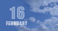 february 16. 16-th day of the month, calendar date.White numbers against a blue sky with clouds. Copy space, winter Royalty Free Stock Photo