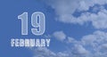 february 19. 19-th day of the month, calendar date.White numbers against a blue sky with clouds. Copy space, winter Royalty Free Stock Photo