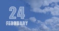 february 24. 24-th day of the month, calendar date.White numbers against a blue sky with clouds. Copy space, winter Royalty Free Stock Photo