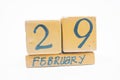 February 29th. Day 29 of month, handmade wood calendar isolated on white background. Winter month, day of the year concept.