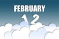 february 12th. Day 12 of month,Month name and date floating in the air on beautiful blue sky background with fluffy clouds. winter