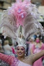 February 20, 2022 - Torrevieja, Spain. Beautiful smiling woman in elaborate pink carnival costume.