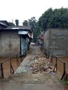 For Editorial Use Only, 20 February 2021, Trash at Small Bridge While Flooding at East Jakarta Indonesia Royalty Free Stock Photo