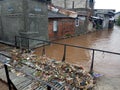 For Editorial Use Only, 20 February 2021, Trash at Small Bridge While Flooding at East Jakarta Indonesia Royalty Free Stock Photo