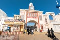 Bahrain and Kuwait pavilions in the Global Village Cultural Complex with visitors and tourists in a