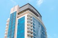 Emaar developer logo on a roof of a high skyscraper tower in Dubai Marina