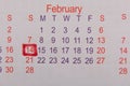 February 14 Valentines Day is marked in red on the calendar. Concept of romantic relationship and Valentine`s Day celebration Royalty Free Stock Photo