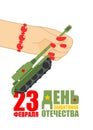 February 23. Woman hand giving tank toy. Traditional gift for me