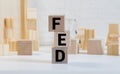 FED, Federal Reserve concept, cube wooden block with alphabet building the word FED Royalty Free Stock Photo