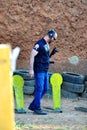 Federal Deputy Eduardo Bolsonaro walking by the targets of the Taubatexas Gun Club shooting range