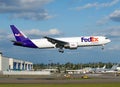 Fedex Boeing 777F Freighter Cargo airplane on touchdown Royalty Free Stock Photo