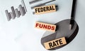 FEDERAL FUNDS RATE wooden block on chart background Royalty Free Stock Photo