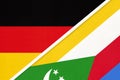 Germany vs Union of the Comoros, symbol of two national flags. Relationship between European and African countries Royalty Free Stock Photo