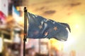 Federated States of Micronesia Flag Against City Blurred Background At Sunrise Backlight