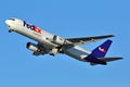 FedEx Freighter airplane takes off with emergency supplies Royalty Free Stock Photo