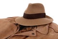 Old Fedora hat, leather jacket, isolated on white background Royalty Free Stock Photo