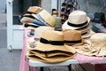 And fedoras for sale on the table in the store