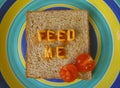 Feed me words on toast Royalty Free Stock Photo