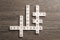 Feedback assistance support guidance words spelled with cubes on wooden table Royalty Free Stock Photo