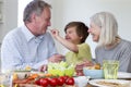 Feeding Grandad a Cream Cracker