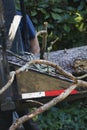 feeding limbs or a downed tree through a woodchipper Royalty Free Stock Photo