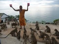 Feeding the monkeys in Temple on the mountain