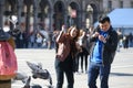 Feeding the pigeons in Milan square, Italy, 04 09 2017