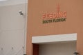 Feeding South Florida food bank building logo