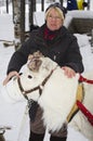 Feeding a young Reindeer,Sweden Royalty Free Stock Photo