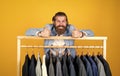 feel extraordinary. bearded hipster use apparel in male atelier. male wardrobe concept. brutal handsome man with