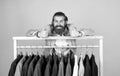 feel extraordinary. bearded hipster use apparel in male atelier. male wardrobe concept. brutal handsome man with