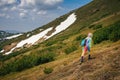 Feel freedom in mountains, woman traveling in unicorn costume Royalty Free Stock Photo