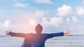 Feel good and freedom concept. Copy space of happy man raise hands on beach background Royalty Free Stock Photo