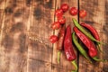 Feel the piquancy. Chili peppers and cherry tomatoes. Red and green vegetables. Organic vegetables Royalty Free Stock Photo