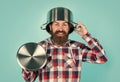 Feel protected. bearded man hold kitchen pan. brutal hipster cooking with saucepan. housekeep husband cook in pot Royalty Free Stock Photo