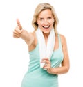 Feeling fit and frisky. a mature woman giving the thumbs up against a studio background. Royalty Free Stock Photo