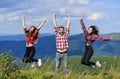 Feeling freedom. Man and girls happy emotional expression. Summer vacation in mountains. Hikers excited about hike Royalty Free Stock Photo