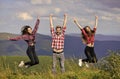Feeling freedom. Man and girls happy emotional expression. Summer vacation in mountains. Hikers excited about hike Royalty Free Stock Photo