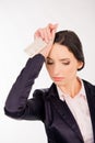 Feeling headache. Frustrated young woman holding headache tablets Royalty Free Stock Photo