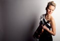 Feeling the heart and soul of music. Studio shot of a beautiful young woman holding a violin. Royalty Free Stock Photo