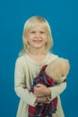 Feeling playful. Small girl hold toy bear. Little child with soft toy. Small kid happy smiling. My favorite childhood Royalty Free Stock Photo