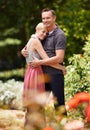 Feeling safe in his arms. a mature couple embracing in the park. Royalty Free Stock Photo