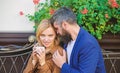 Feeling sensual. Morning coffee. Couple in love on romantic date. woman and man with beard relax in cafe. First meet of Royalty Free Stock Photo