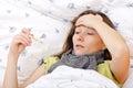 Feeling sick and having high fever Royalty Free Stock Photo