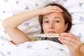 Feeling sick and having high fever Royalty Free Stock Photo